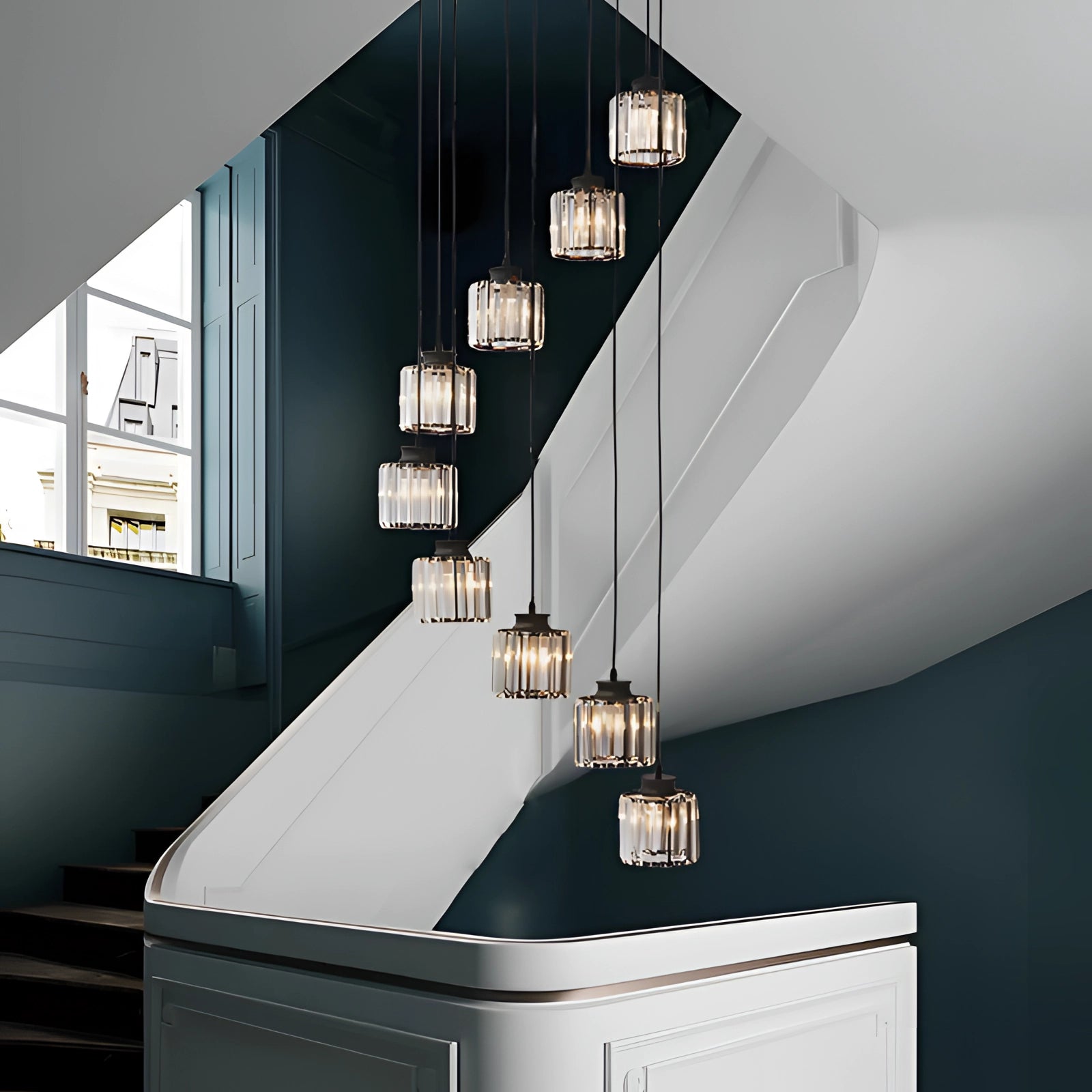 Ribbed glass multi-light pendant lamp with bronze adjustable cluster design hanging in a modern interior space featuring wooden flooring and cabinetry.