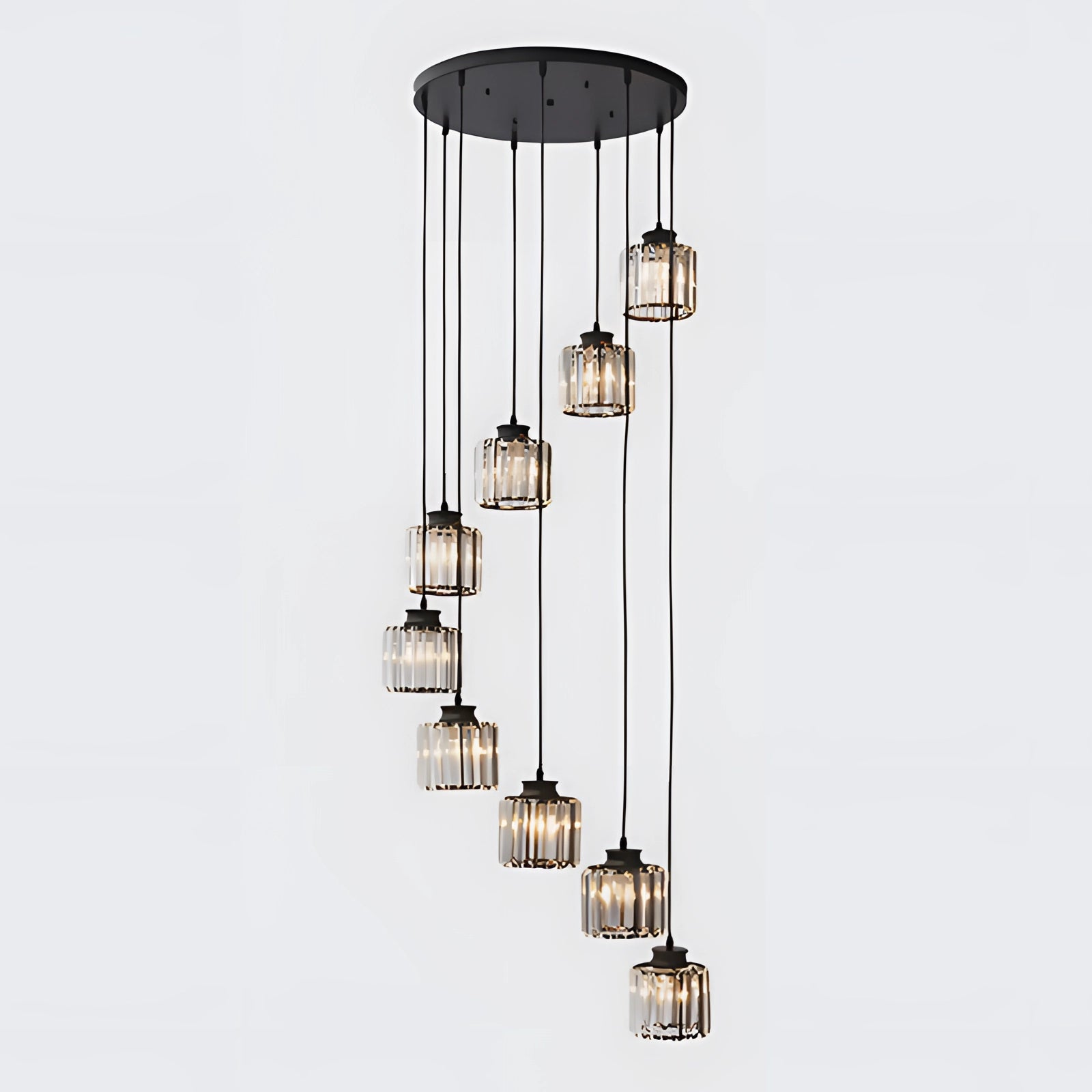 Ribbed glass multi-light pendant in bronze finish, featuring an adjustable cluster design with nine black cylindrical lamp shades, elegantly suspended as a modern light fixture.