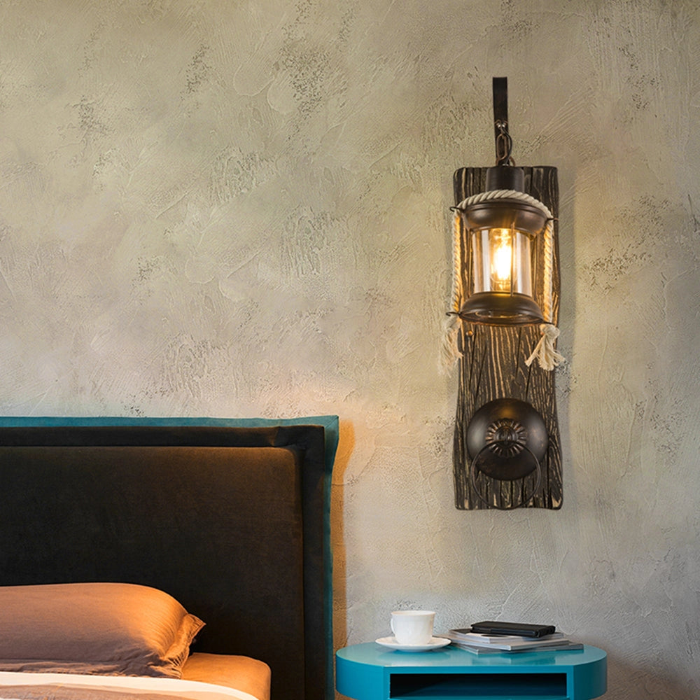 Rustic nautical lantern with a vintage sconce design, featuring a rectangular wooden frame and a grey finish, ideal for coastal interior decor.