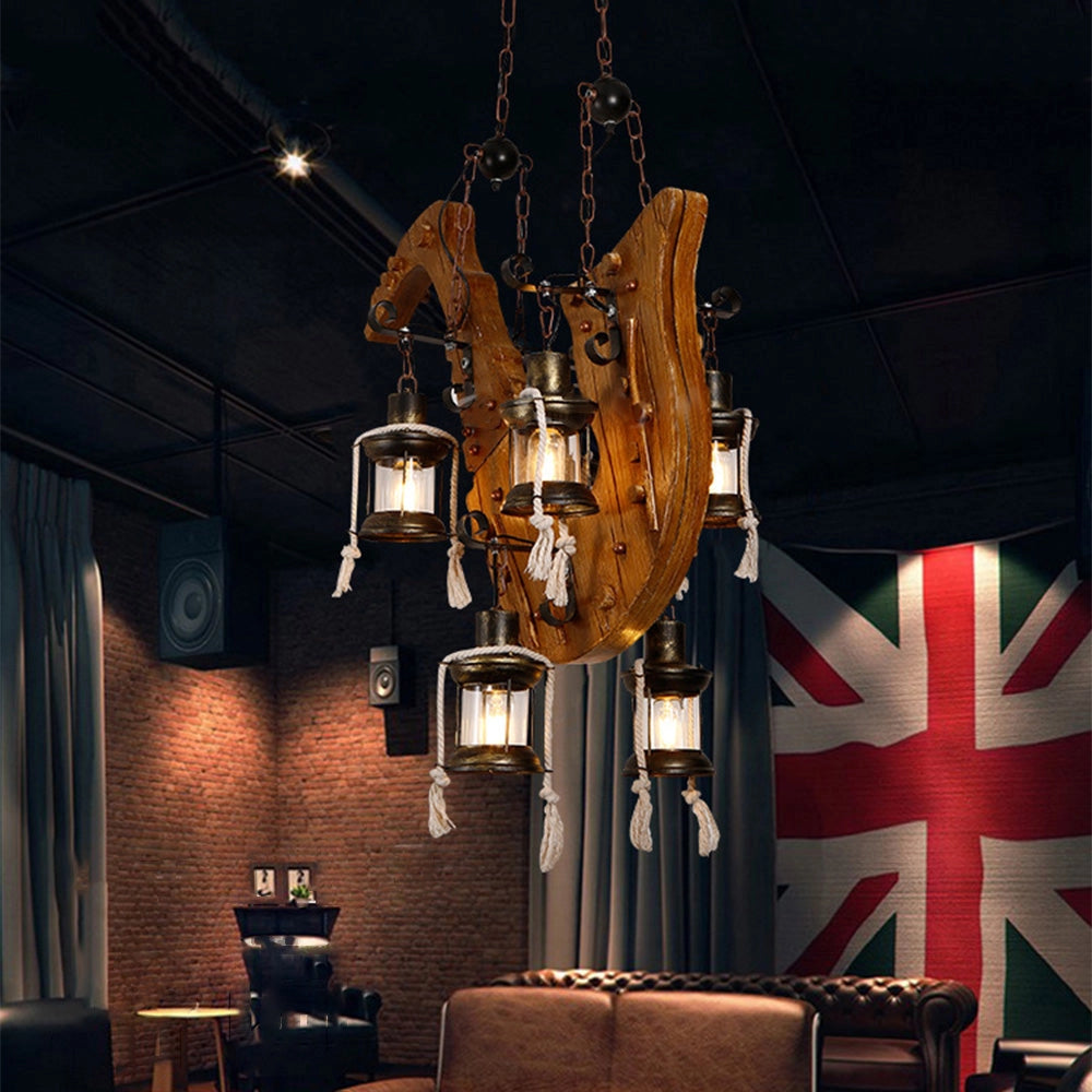 Rustic wooden wheel chandelier with a 31.5-inch diameter, featuring a vintage farmhouse design. The light fixture is crafted from wood and metal, hanging from the ceiling with multiple light bulbs, casting warm tints and shades.