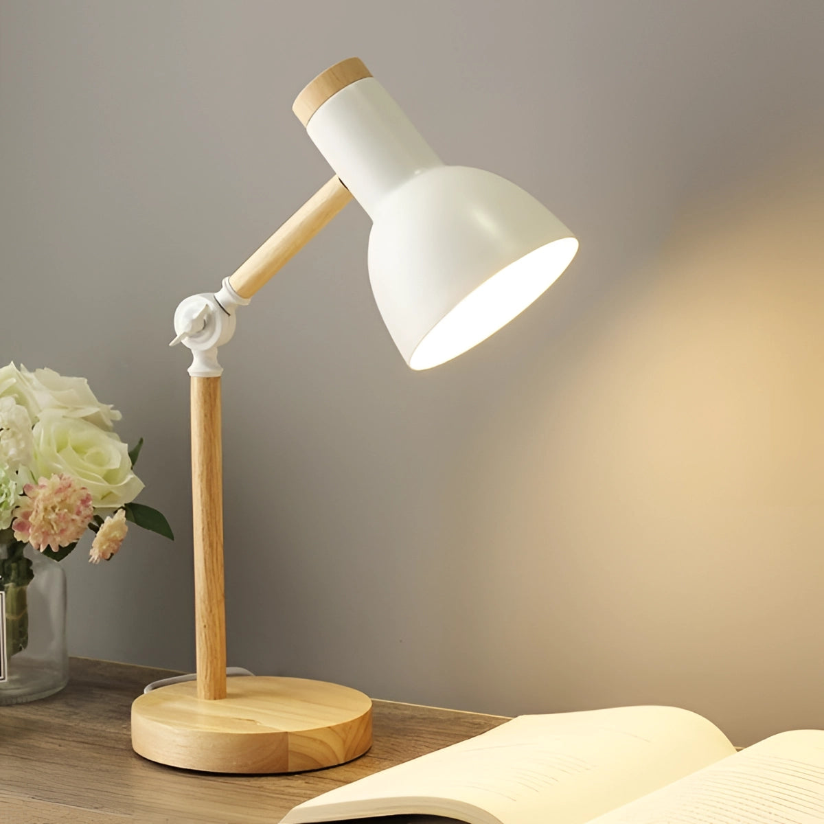 Scandinavian wooden adjustable LED desk lamp in retro style with a white finish, featuring a three-color light switch option, set against a minimalist background.