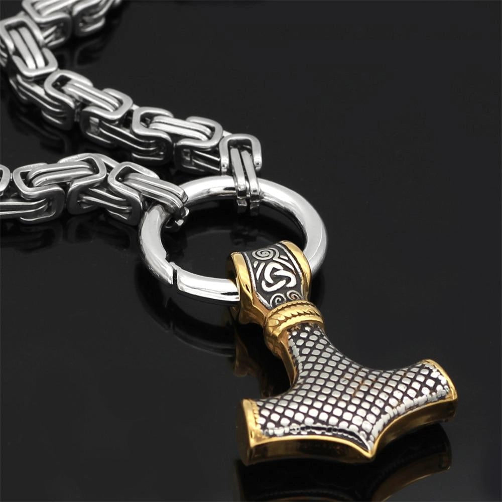 Silver Viking Wolf Head and Mjolnir pendant necklace, featuring intricate Norse designs, crafted in metal, for men's fashion and jewelry collection.