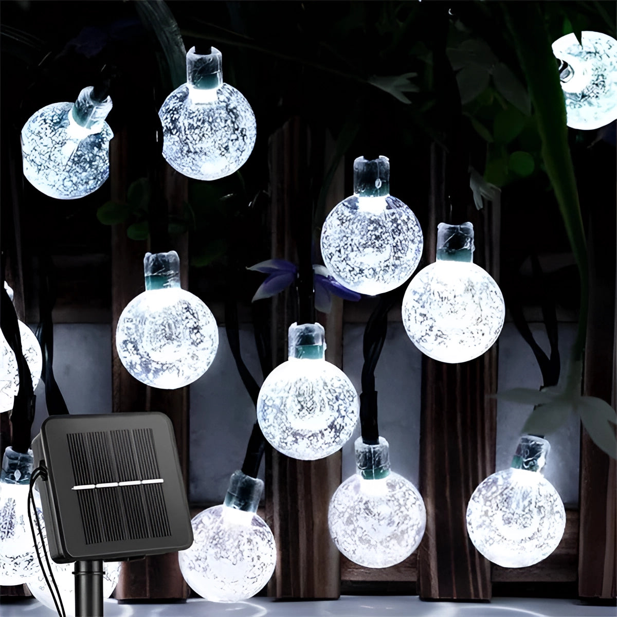 Solar crackled glass globe lights with a waterproof design featuring LED string lights, displayed in a creative arrangement. The lights are primarily white and are housed in spherical black glass globes, emphasizing both artistic and natural elements.