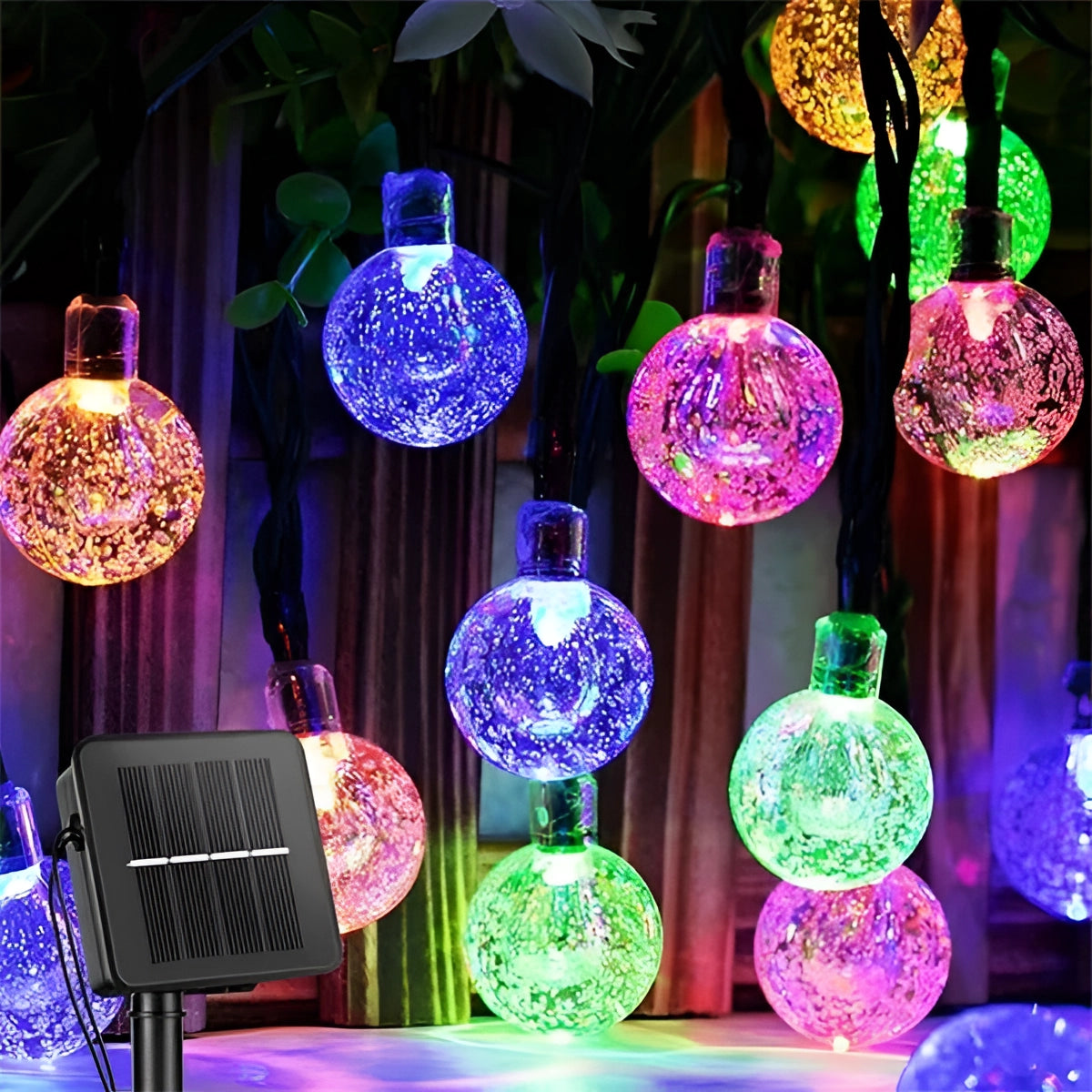Solar crackled glass globe lights in shades of purple, blue, and magenta, designed as outdoor waterproof LED string lighting fixtures. The globes are circular with a textured glass surface that enhances the colored tints when illuminated.