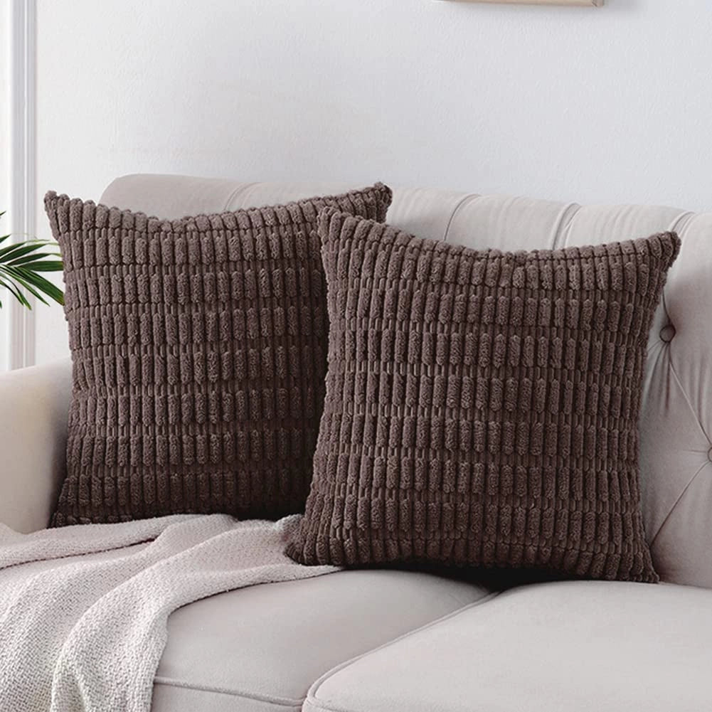 Beige textured corduroy cushions on a grey studio couch, featuring a 2-pack of 45x45cm coffee-colored lumbar pillows for home decor.