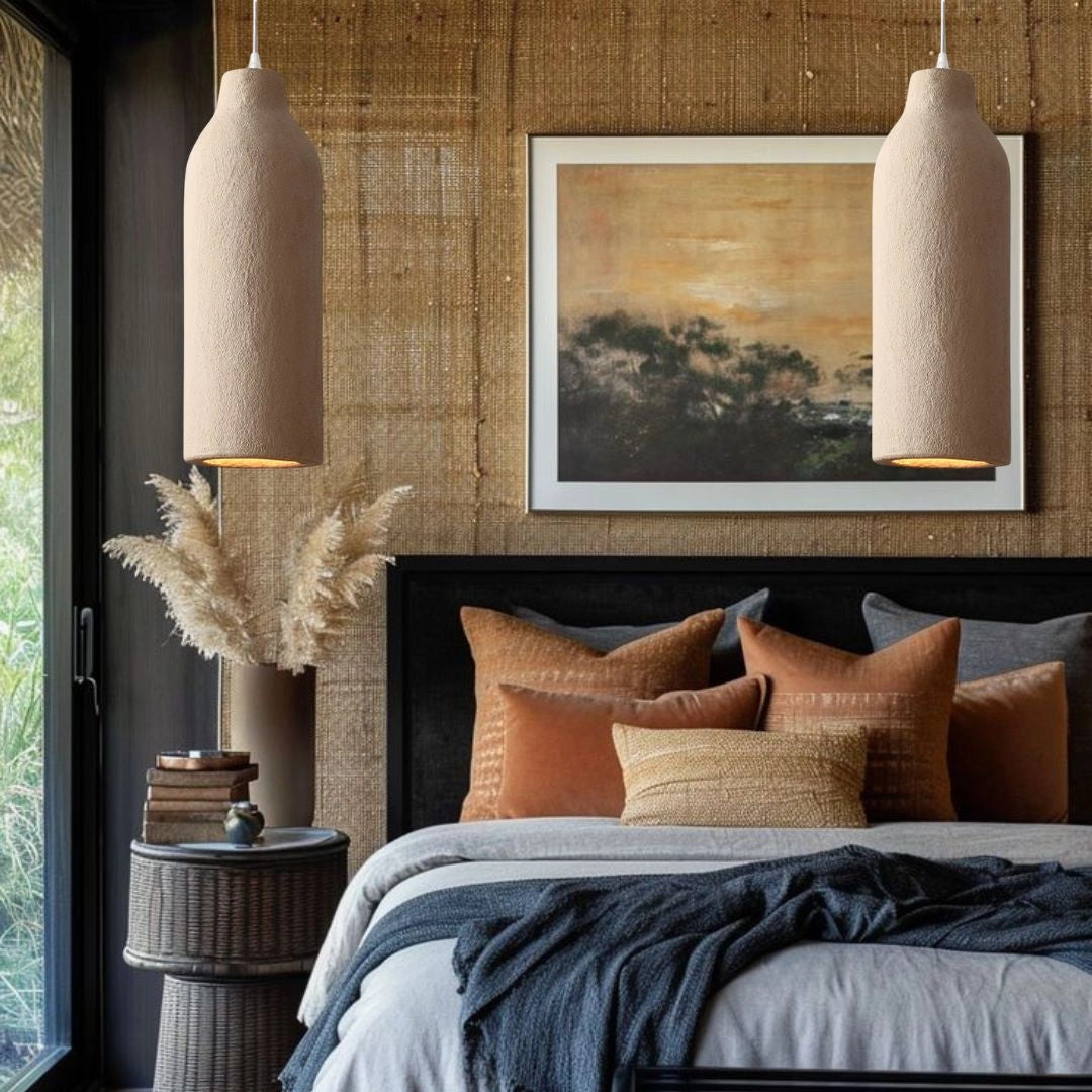 Textured oversized pendant light with a minimalist design, featuring a wooden accent, hanging in a modern dining room setting with azure tones.
