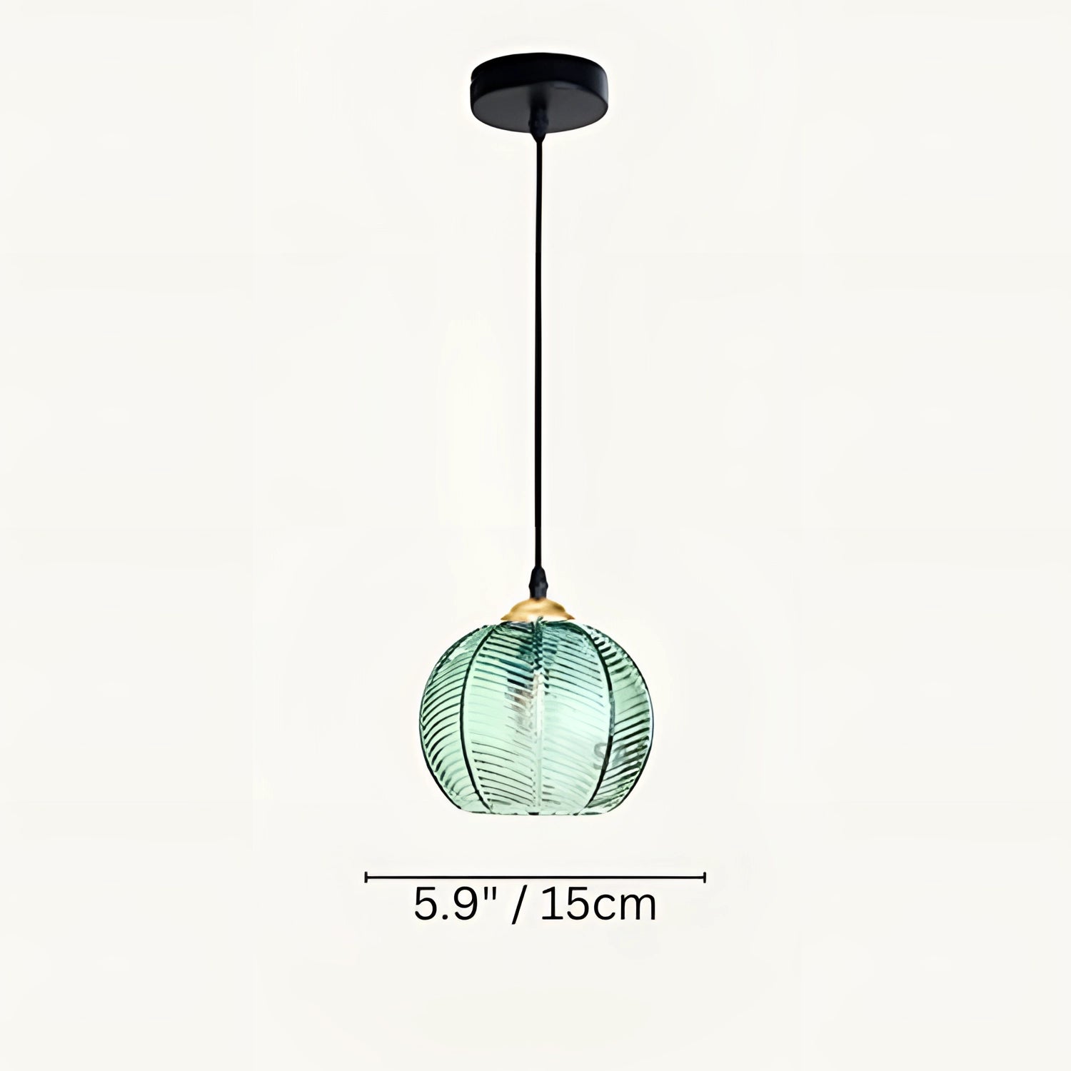 A trio of luxury tropical pendant lights with botanical leaf glass decor, each light measuring 8.6 inches (22 cm) in diameter, hanging from the ceiling.