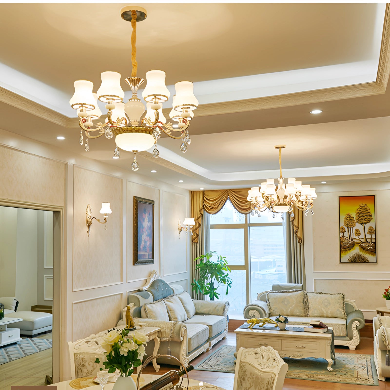 Vintage brass pendant light with an antique winged chandelier design and 8-light configuration, elegantly illuminating a stylish interior space with wooden furniture and decorative accents.