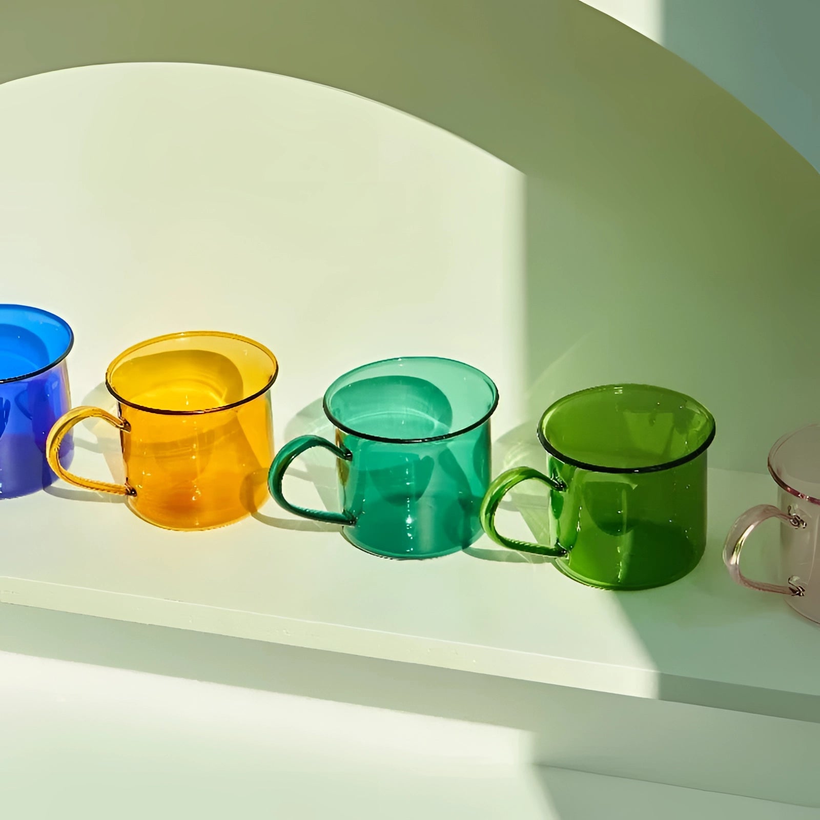 Vintage cobalt blue enamel mugs set displayed, showcasing their durable design ideal for outdoor use, with a distinctive blue color and classic style suitable for serving coffee or other beverages.