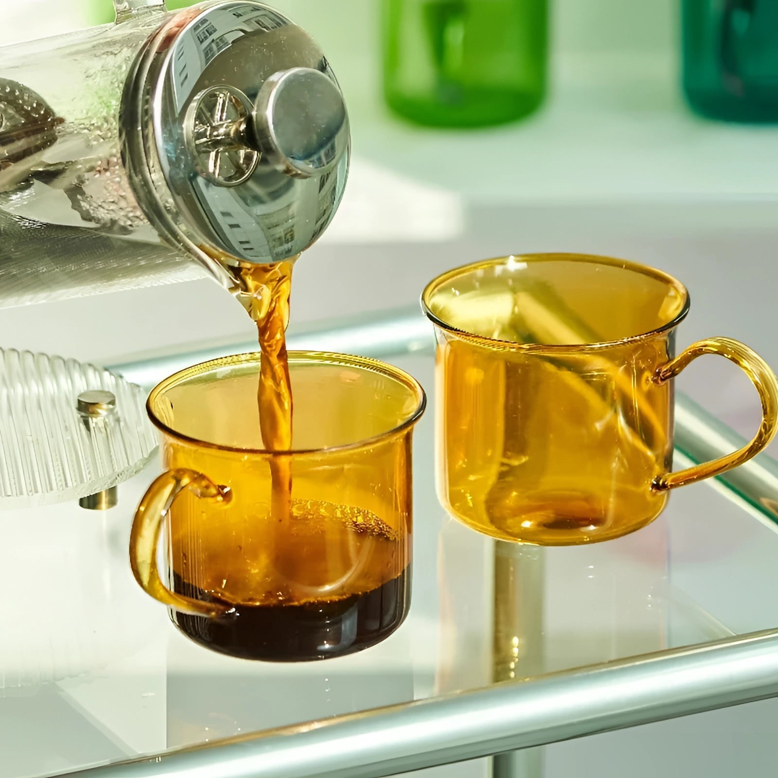 Vintage cobalt blue enamel mug set featuring durable construction, ideal for outdoor drinkware; the mugs are prominently displayed, showcasing their vibrant color and sturdy design, suitable for various beverages.