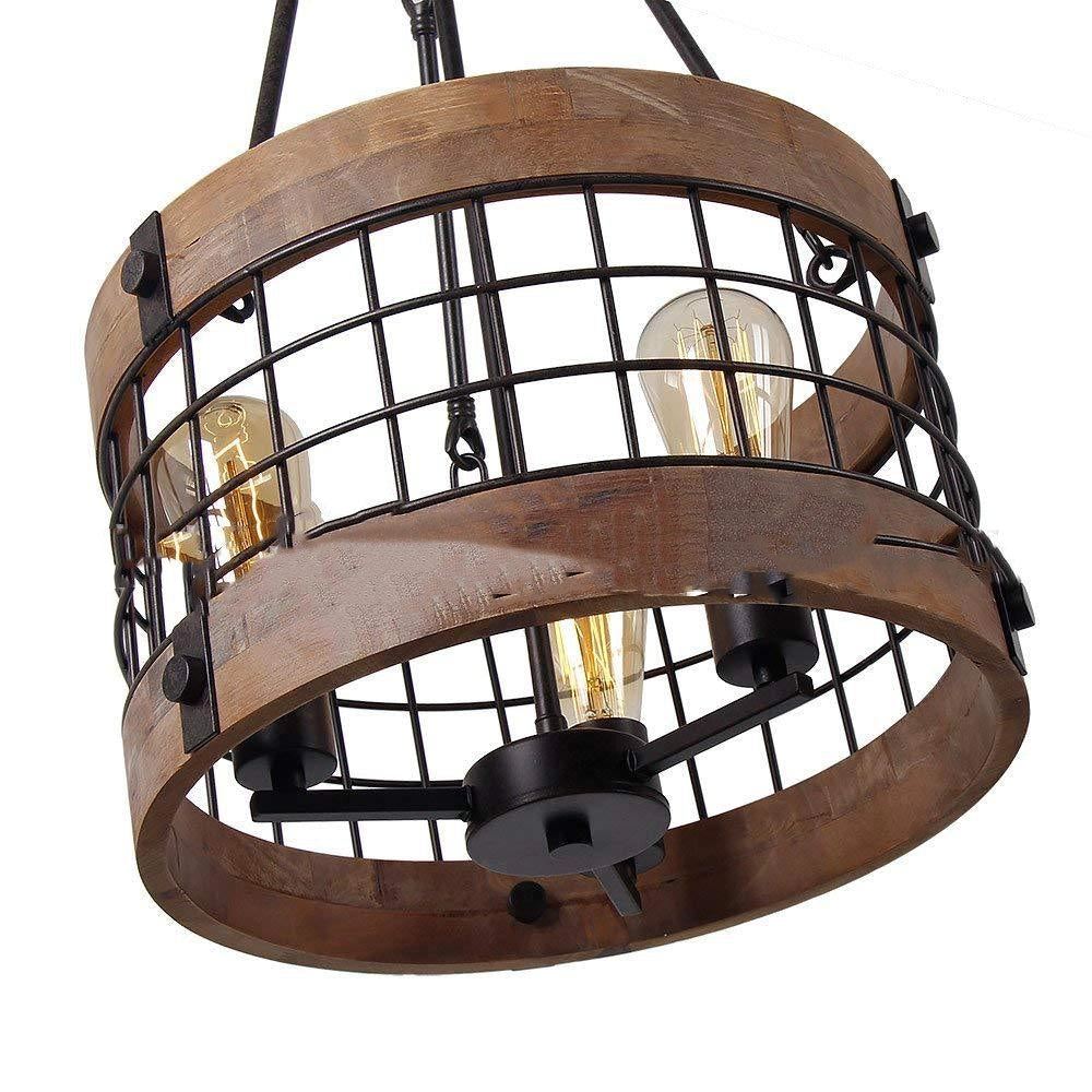 Vintage rustic black wood LED cage chandelier with a farmhouse design, featuring a circular metal frame and wooden accents, suspended from the ceiling and illuminated, creating a warm and inviting atmosphere.