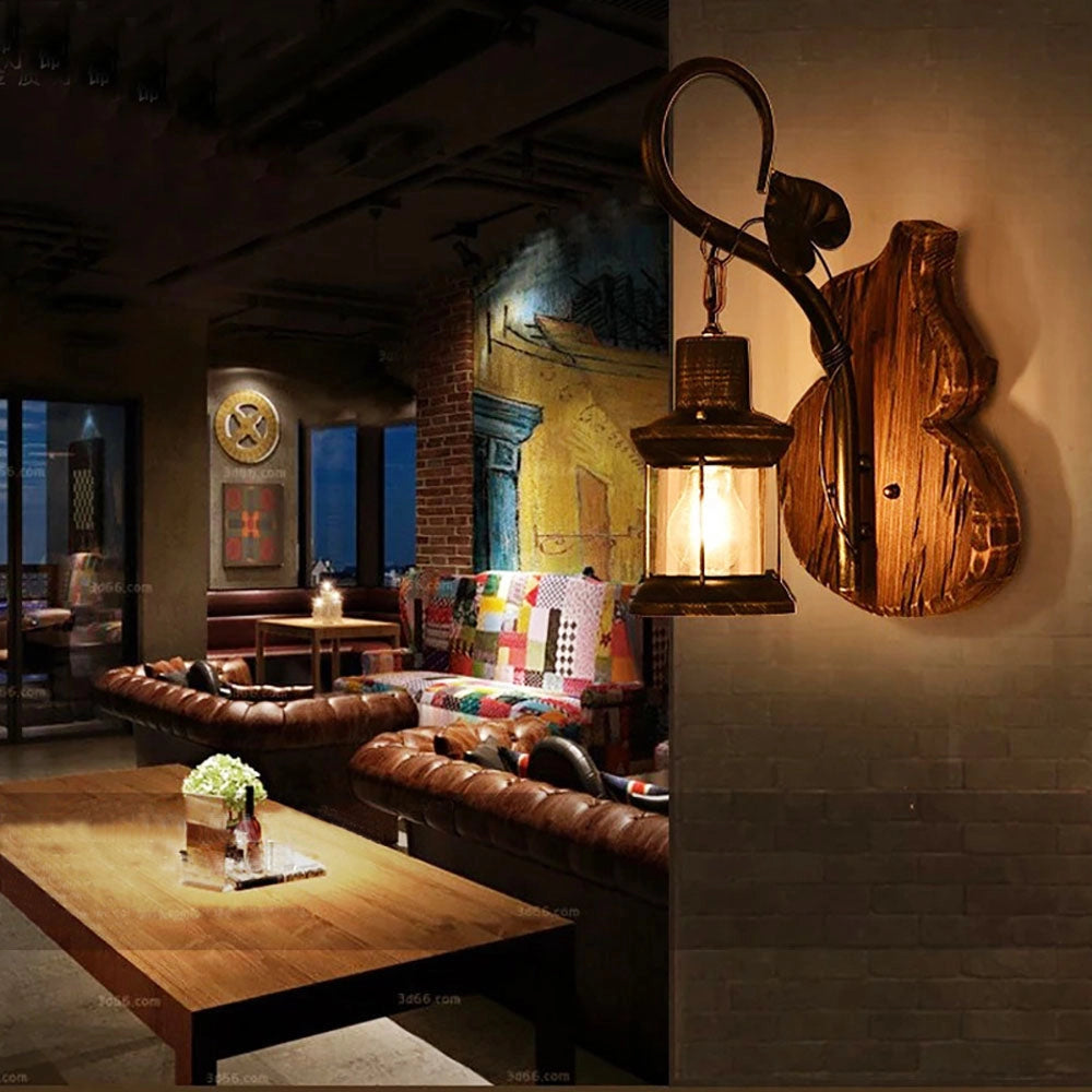 Vintage rustic wall lantern made of antique metal and pine wood, styled as a sconce decor piece, elegantly displayed in a living room setting with complementary furniture and interior design elements.