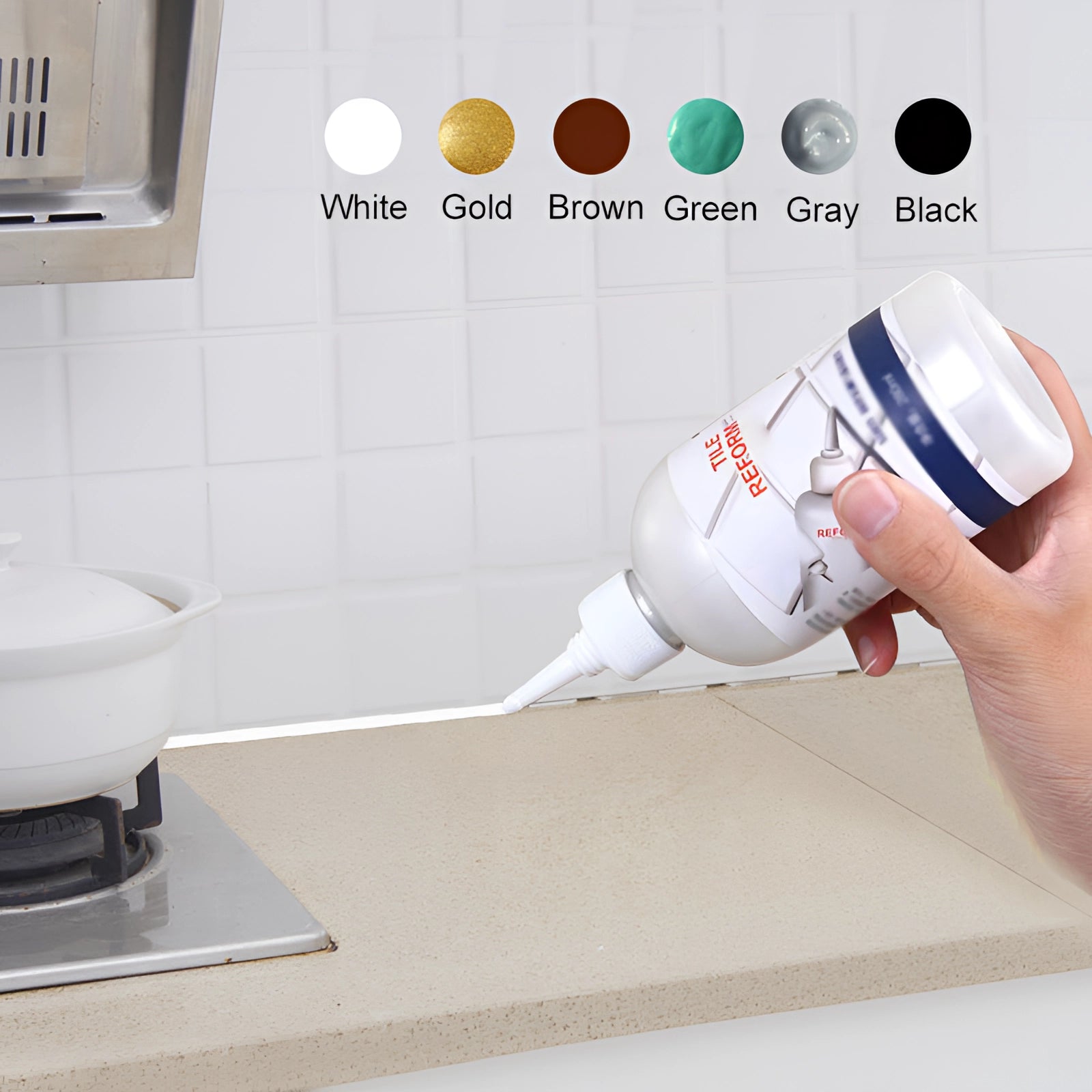 A hand applying waterproof mold-resistant kitchen sealant to a countertop gap, illustrating the use of a fluid product for filling and sealing purposes.