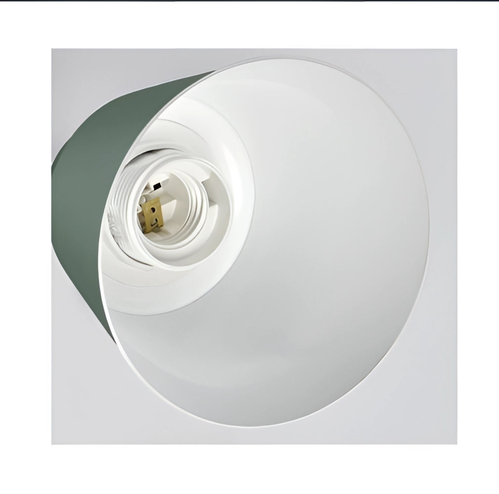 Modern Scandinavian Yellow Pendant Light hanging above a bedside table with a sleek, circular design.