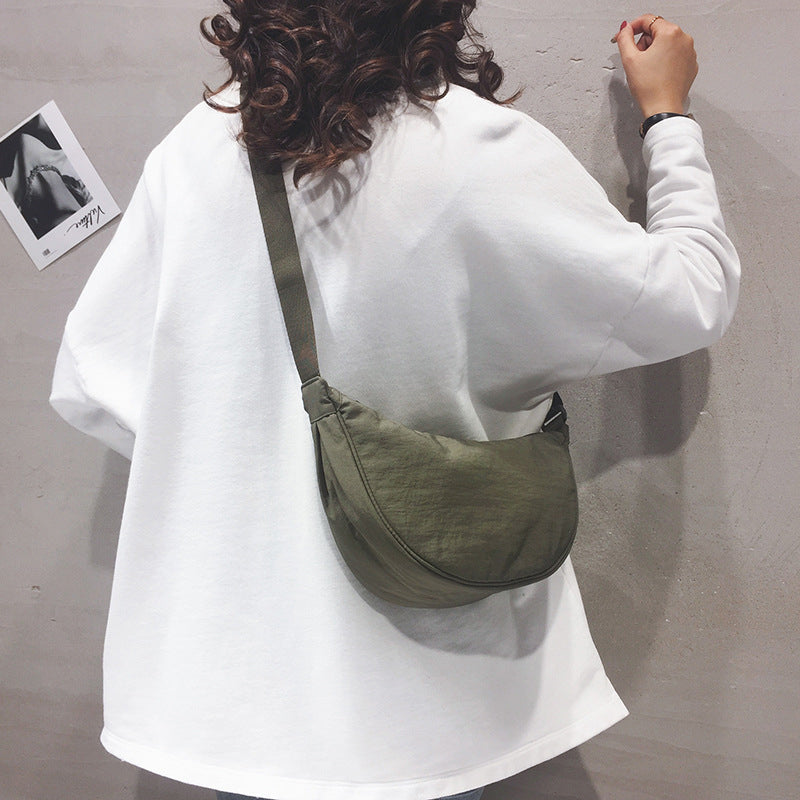 Crescent-shaped Crossbody Bag | Durable Polyester | Adjustable Strap | Compact & Organized Storage