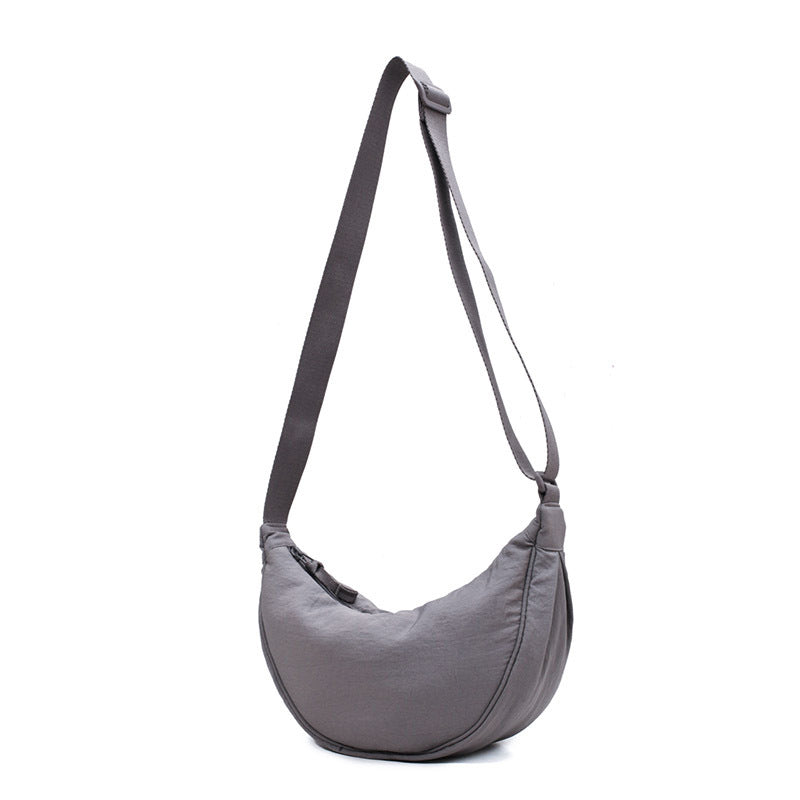 Crescent-shaped Crossbody Bag | Durable Polyester | Adjustable Strap | Compact & Organized Storage