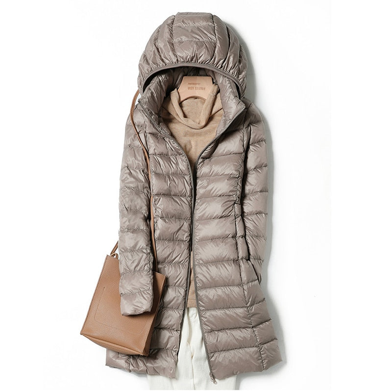 Women's Quilted Hooded Longline Puffer Coat | Feather-Light Insulation | Weatherproof Design | Comfortable Fit