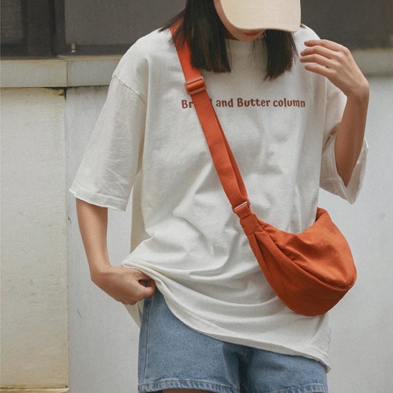 Crescent-shaped Crossbody Bag | Durable Polyester | Adjustable Strap | Compact & Organized Storage