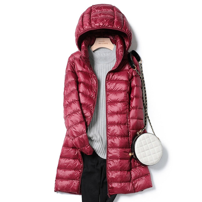 Women's Quilted Hooded Longline Puffer Coat | Feather-Light Insulation | Weatherproof Design | Comfortable Fit
