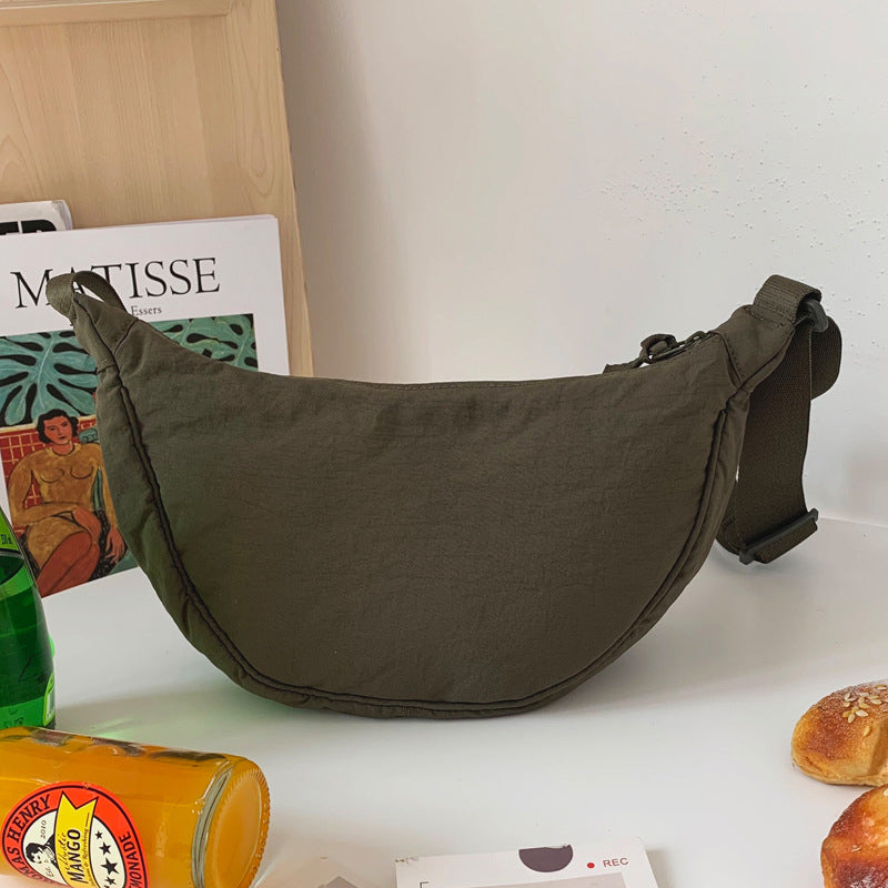 Crescent-shaped Crossbody Bag | Durable Polyester | Adjustable Strap | Compact & Organized Storage