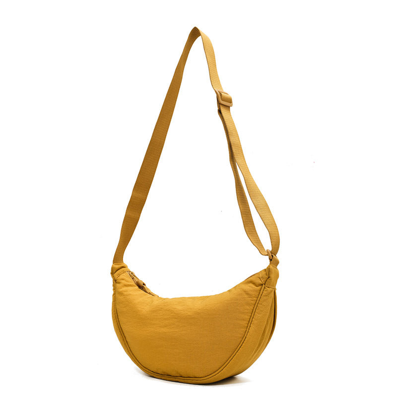Crescent-shaped Crossbody Bag | Durable Polyester | Adjustable Strap | Compact & Organized Storage