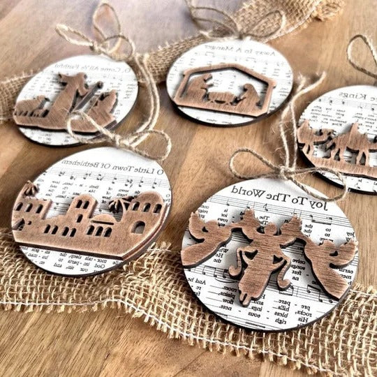 Collection of Ornaments Featuring Nativity Music Sheets