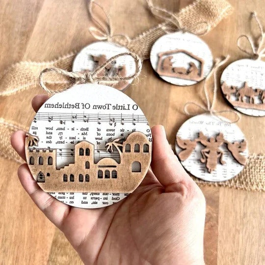 Collection of Ornaments Featuring Nativity Music Sheets