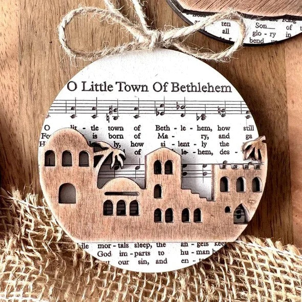 Collection of Ornaments Featuring Nativity Music Sheets
