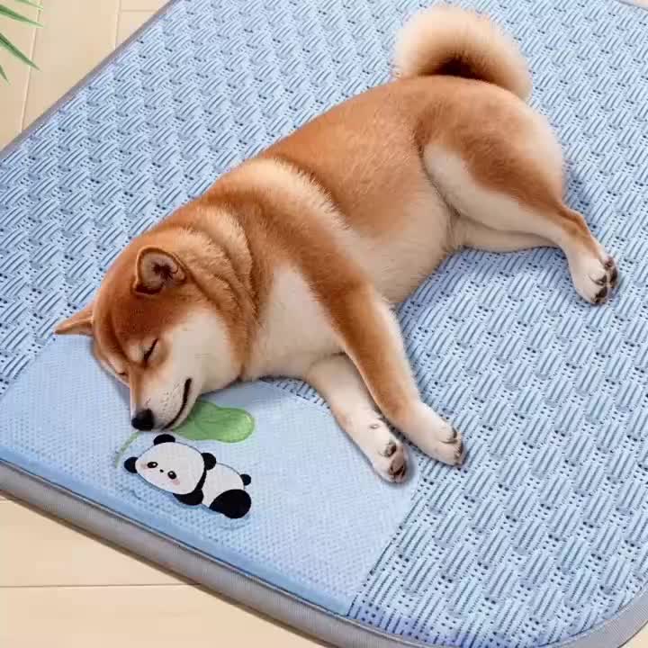 Dog Cooling Mat with Ice Bead Texture Fabric, Featuring Gray Piping Edges and an Adorable Panda Hugging a for Lotus Leaf Pattern Printed Underneath. Specially Designed for Pets During Summer. This Cooling Pad Serves as a Summer Cooling Sleeping Mat