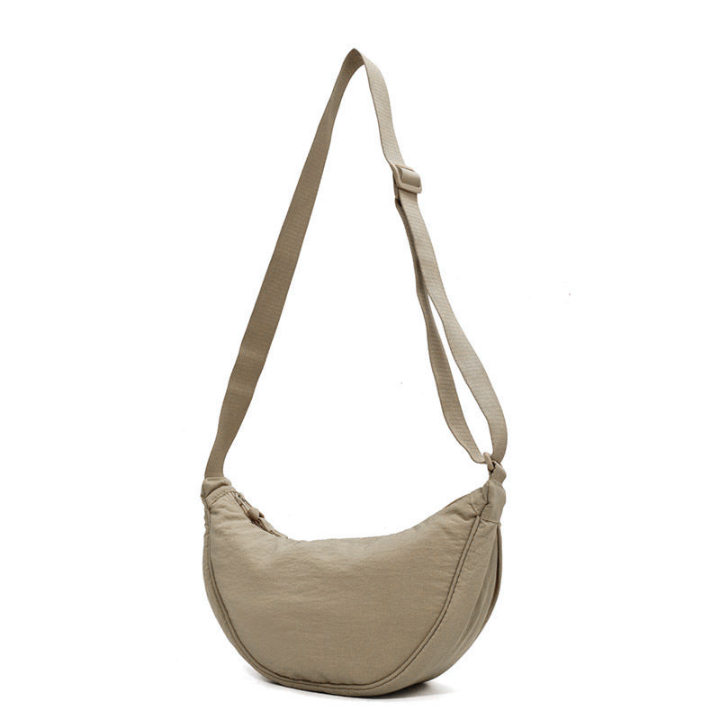 Crescent-shaped Crossbody Bag | Durable Polyester | Adjustable Strap | Compact & Organized Storage