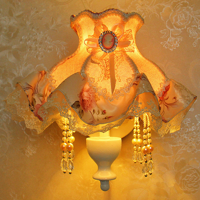 1-Light Taavita Garden Wall Light with Ruffle Pink Fabric Shade, Curved Arm, and Crystal Decoration