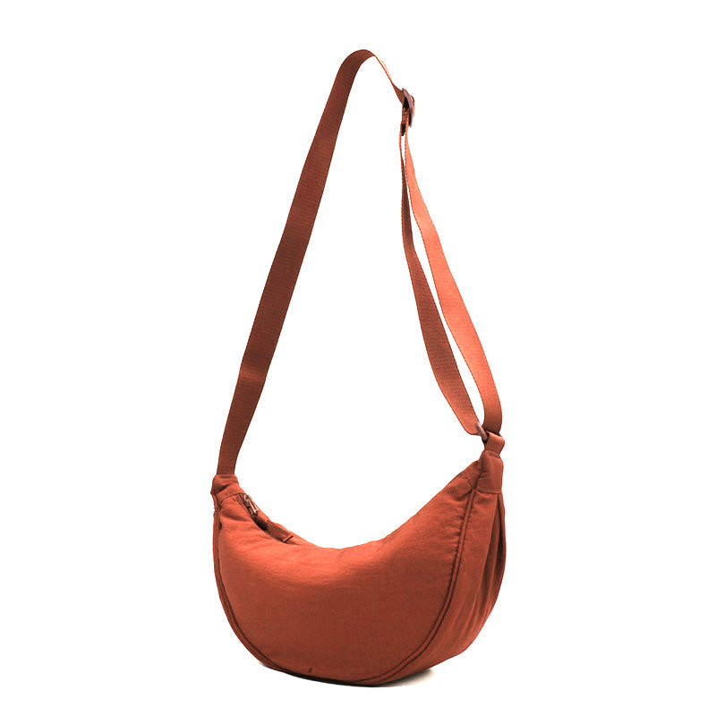 Crescent-shaped Crossbody Bag | Durable Polyester | Adjustable Strap | Compact & Organized Storage