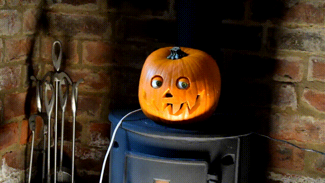 Spooky Halloween Pumpkin Decoration with Rotating Eyeballs