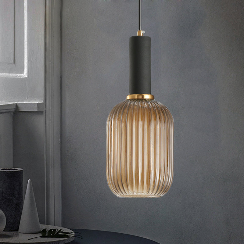 Black/Gold Cylinder/Oval/Capsule Pendant Lamp Modernist 1 Light Grey/Green/Amber Ribbed Glass Ceiling Light Fixture for Kitchen Black Gray Oval Clearhalo 'Ceiling Lights' 'Glass shade' 'Glass' 'Modern Pendants' 'Modern' 'Pendant Lights' 'Pendants' Lighting' 598358