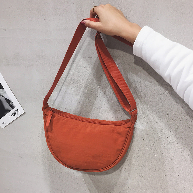 Crescent-shaped Crossbody Bag | Durable Polyester | Adjustable Strap | Compact & Organized Storage
