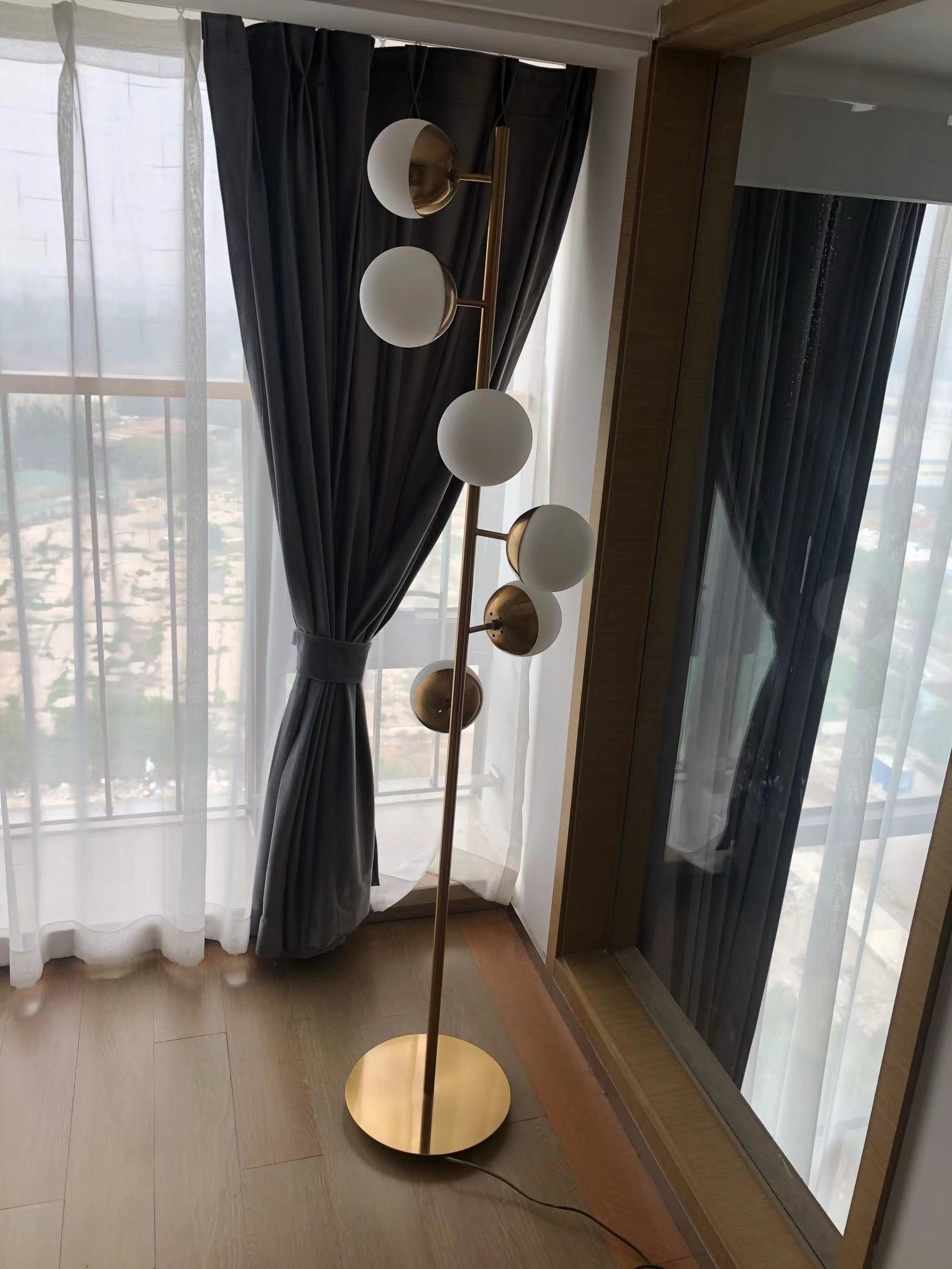 LuxeSphere LED Floor Lamp with Glass Accents on Gold Stand