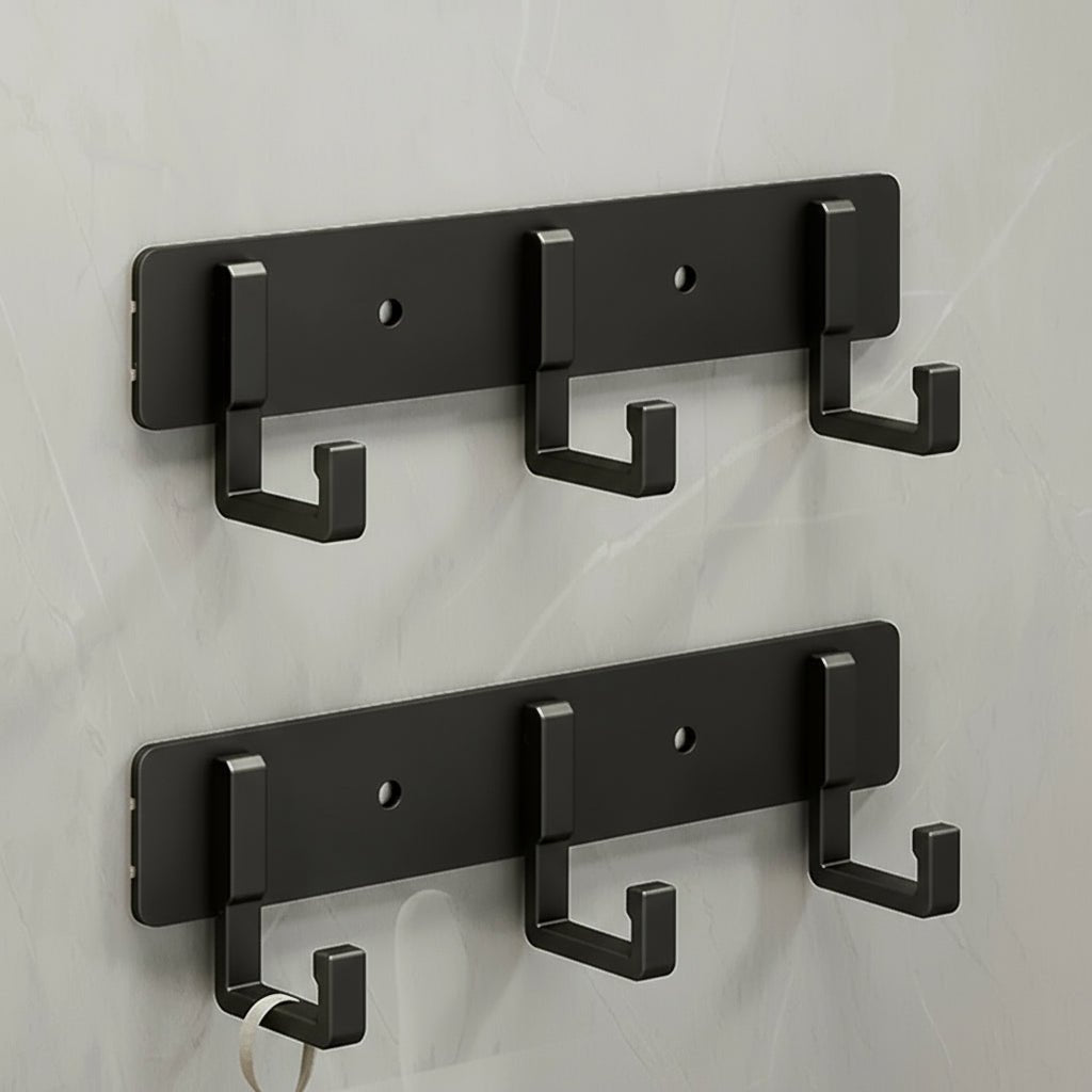 Elegant Wall-Mounted Coat Organizer with Sleek Black Hooks