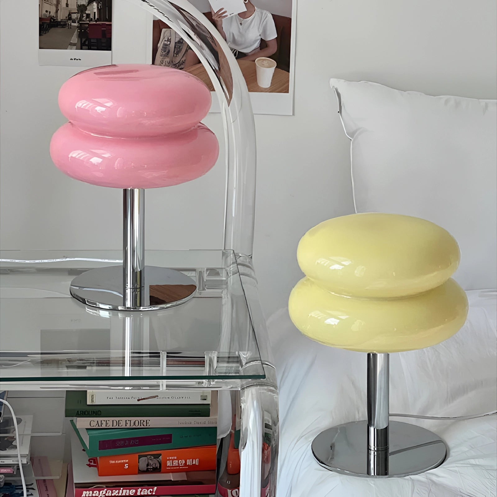 Orange mushroom-shaped lamp with a chrome base, reflecting a modern retro design from the 1970s, displayed in a stylish interior setting with white and pink accents.
