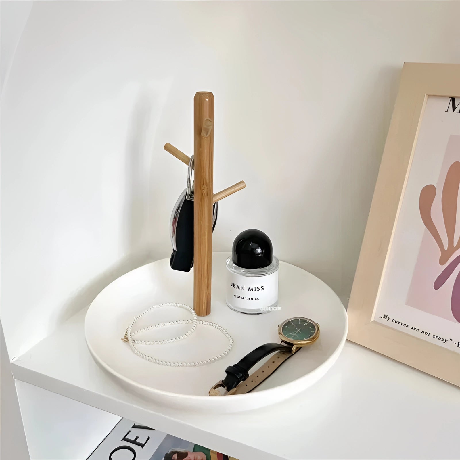 A 20cm non-stick frying pan with a bamboo handle resting on a wooden table. The pan features an ergonomic design, showcasing its smooth surface and sturdy handle.