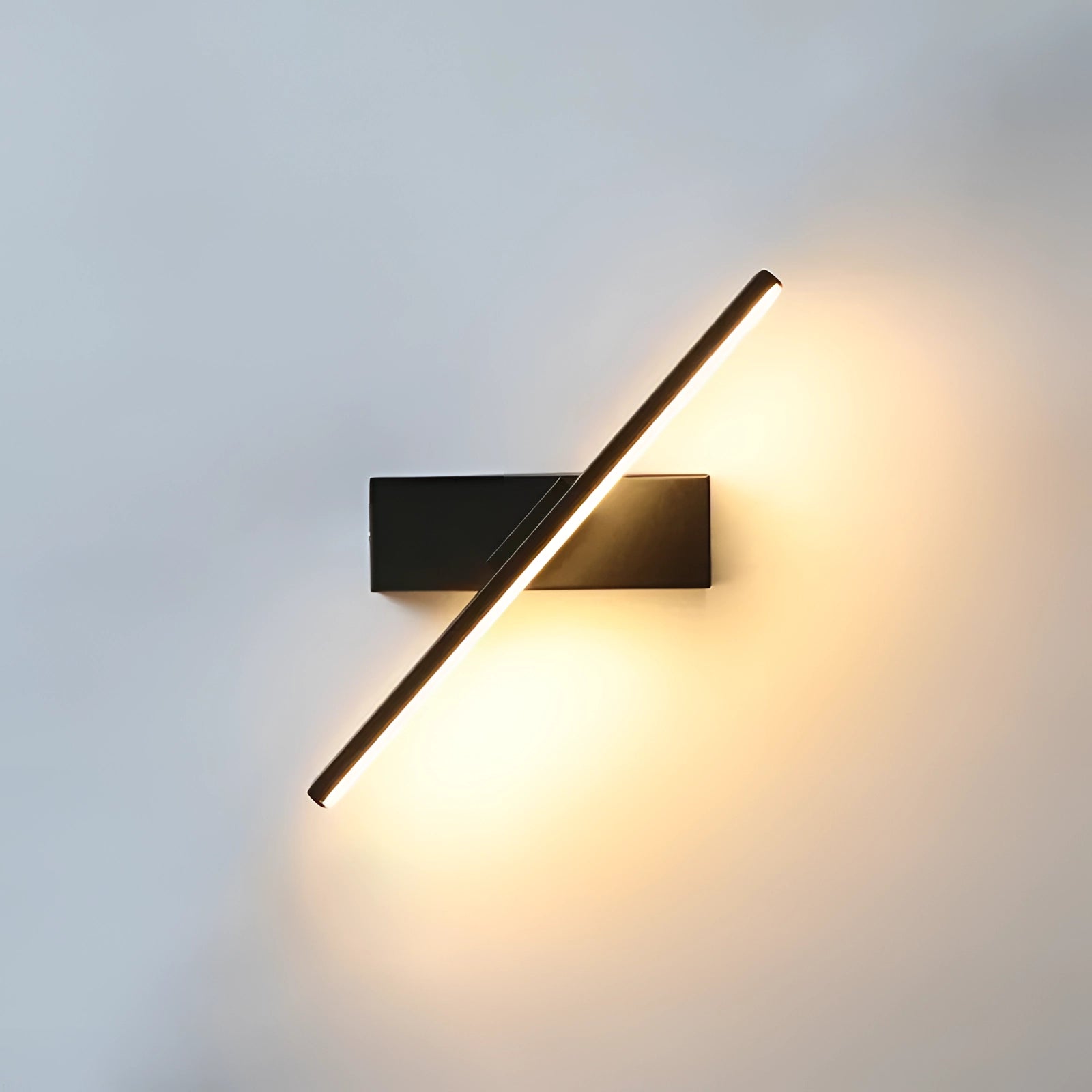Modern minimalist LED wall light fixture with a 330-degree rotatable design, featuring a sleek metal structure in a triangular shape, mounted on a wooden wall.