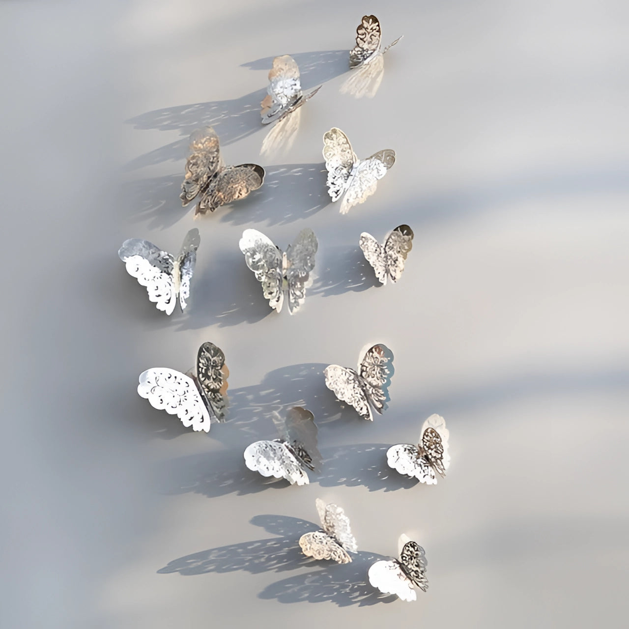 
A luxurious 3D wall art piece featuring a detailed butterfly sculpture in a metallic silver finish, elegantly capturing the essence of a butterfly's intricate beauty.