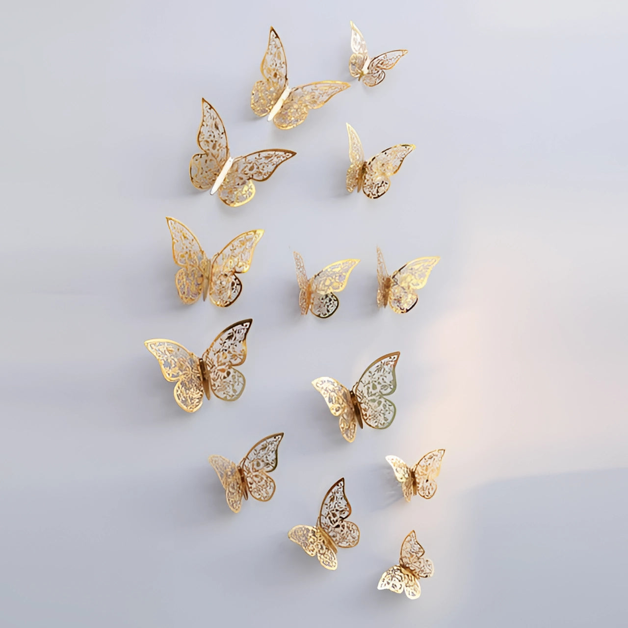 3D gold butterfly wall art featuring intricately designed metallic butterflies, showcasing luxury decor with a shiny, gold finish, perfect for adding elegance to any interior space.