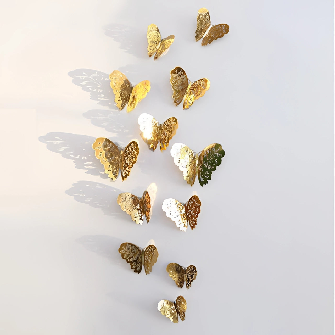 
3D gold butterfly wall art sculpture showcasing a luxurious metallic design resembling a butterfly with intricate detailing, set against a subtle background.