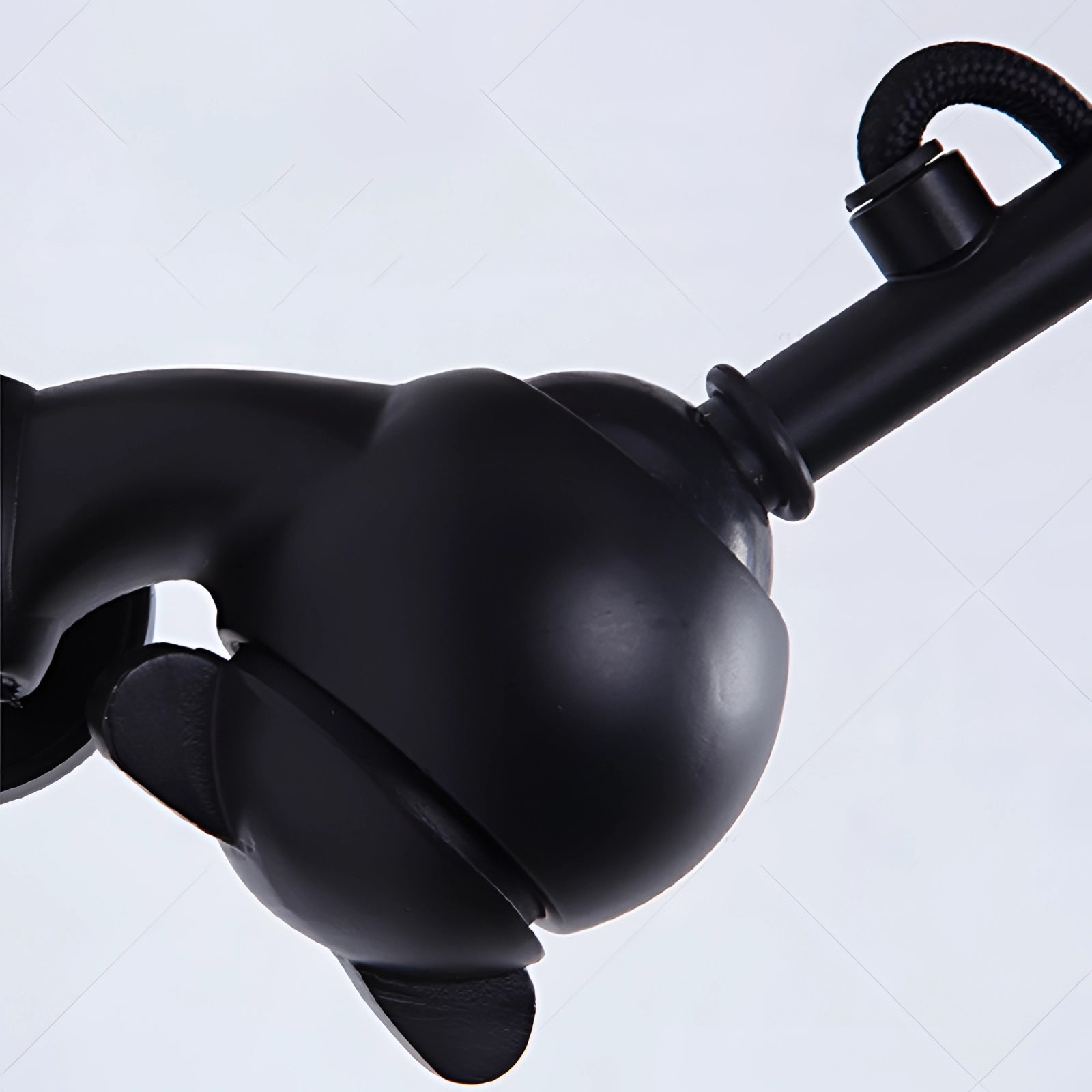 Adjustable black metal wall lamp with an industrial design and LED sconce, featuring an articulated arm and sleek metal finish.