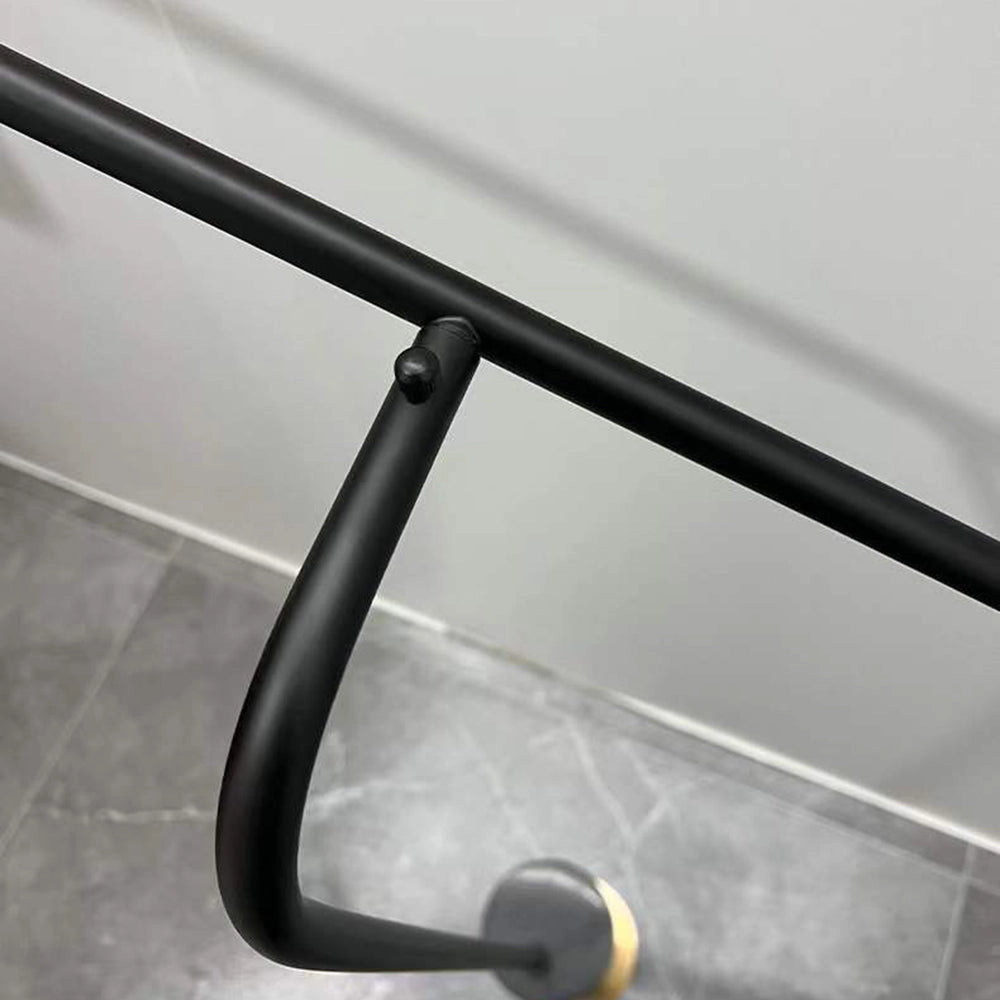 Adjustable Nordic floor lamp in black and gold, featuring a sleek metal frame and stylish design, perfect for modern home lighting.