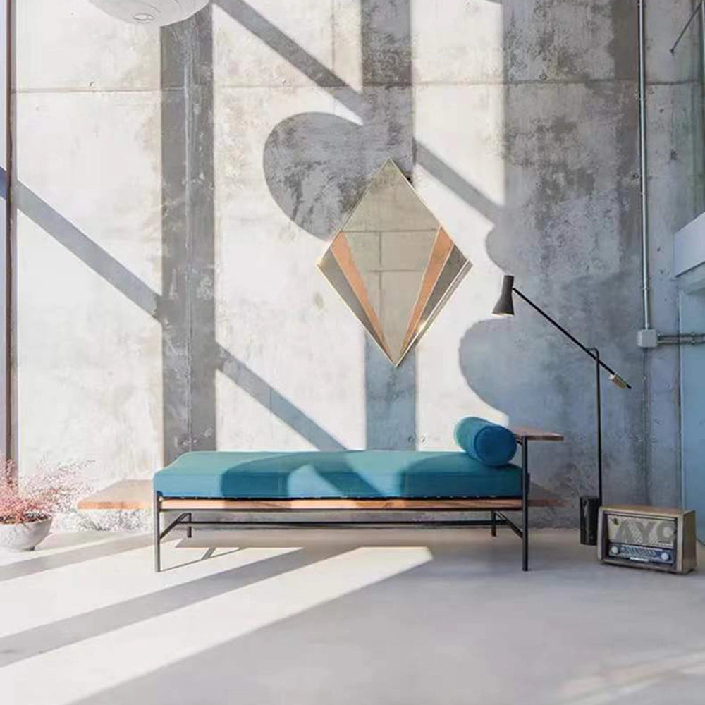 Adjustable Nordic floor lamp in black and gold with a minimalist design, featuring a rectangular shade, placed in a modern interior setting with wooden flooring.