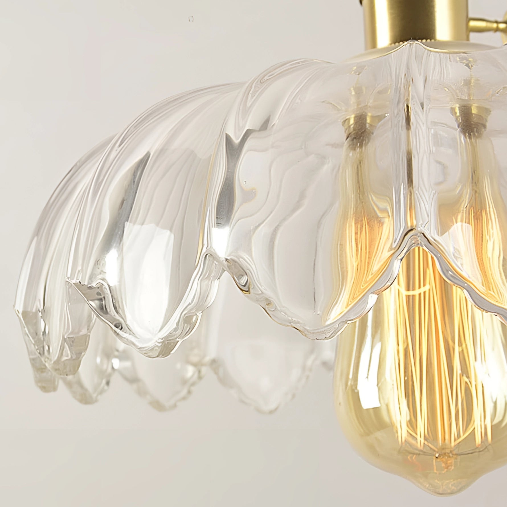 Amber Glass Pendant Light featuring a Vintage Flower design with an Antique Brass Finish, hanging as a ceiling fixture.