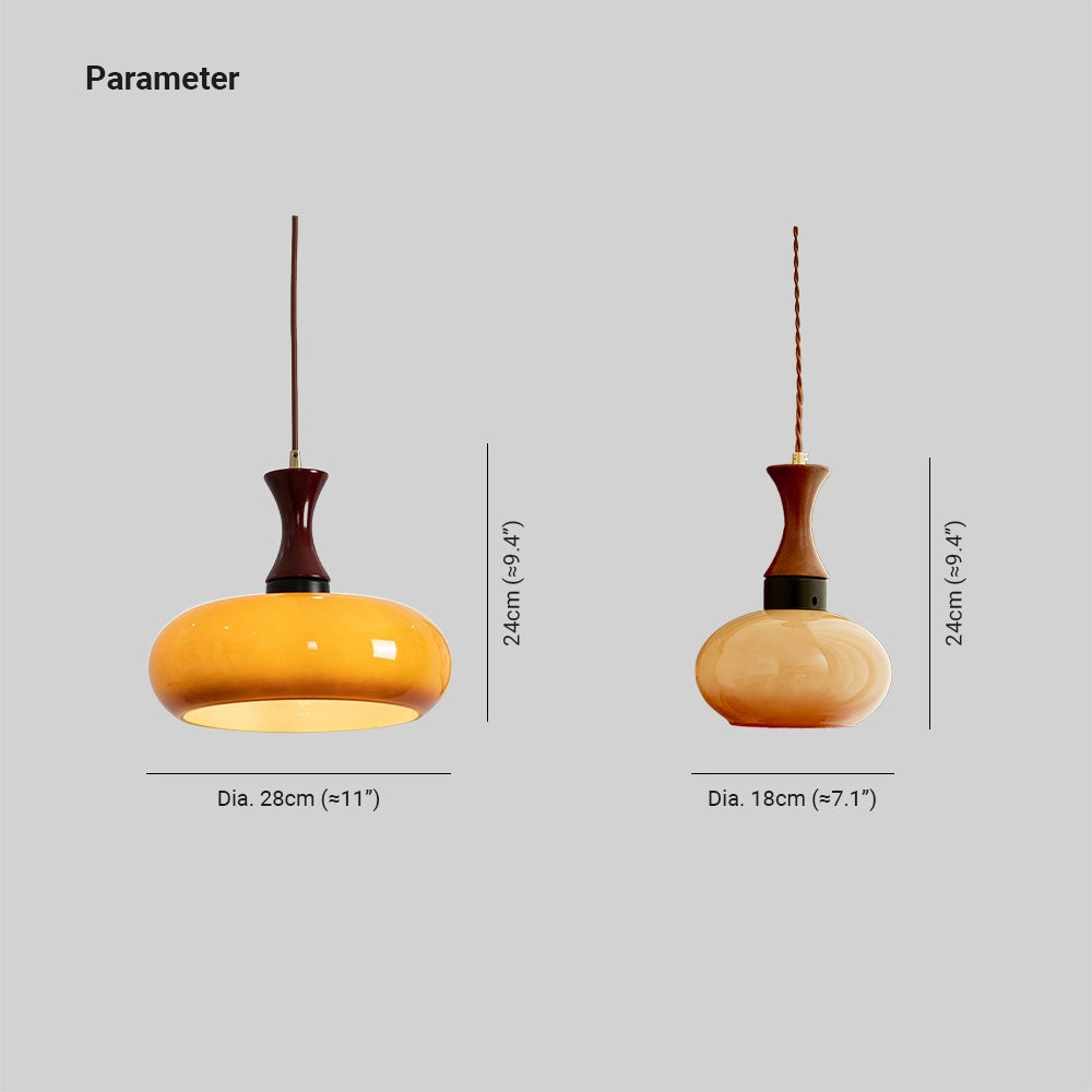 Amber glass retro pendant light with a mid-century modern design, featuring a wooden circular base and metal components, hanging elegantly in a still life setting.