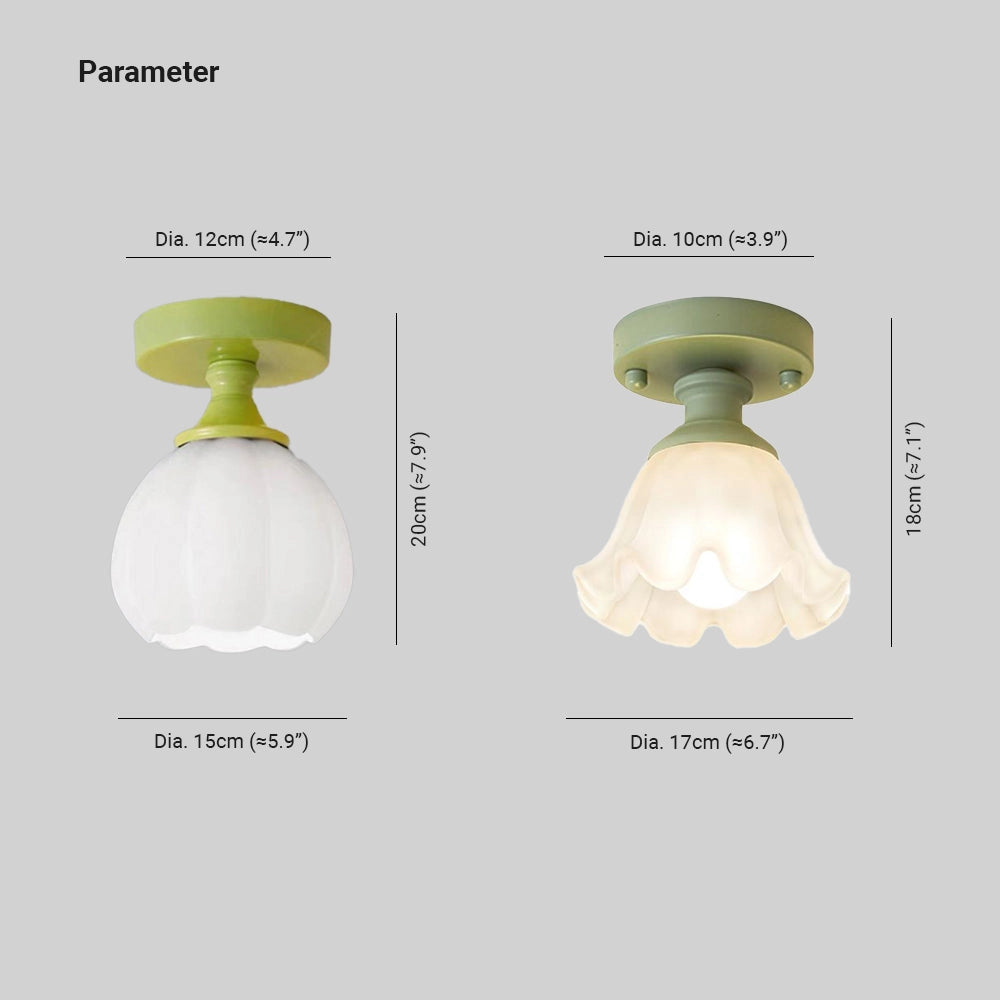 Art Nouveau vintage flush mount light featuring a tulip-shaped glass shade and brass fixture designed in an elegant style, mounted on a ceiling.