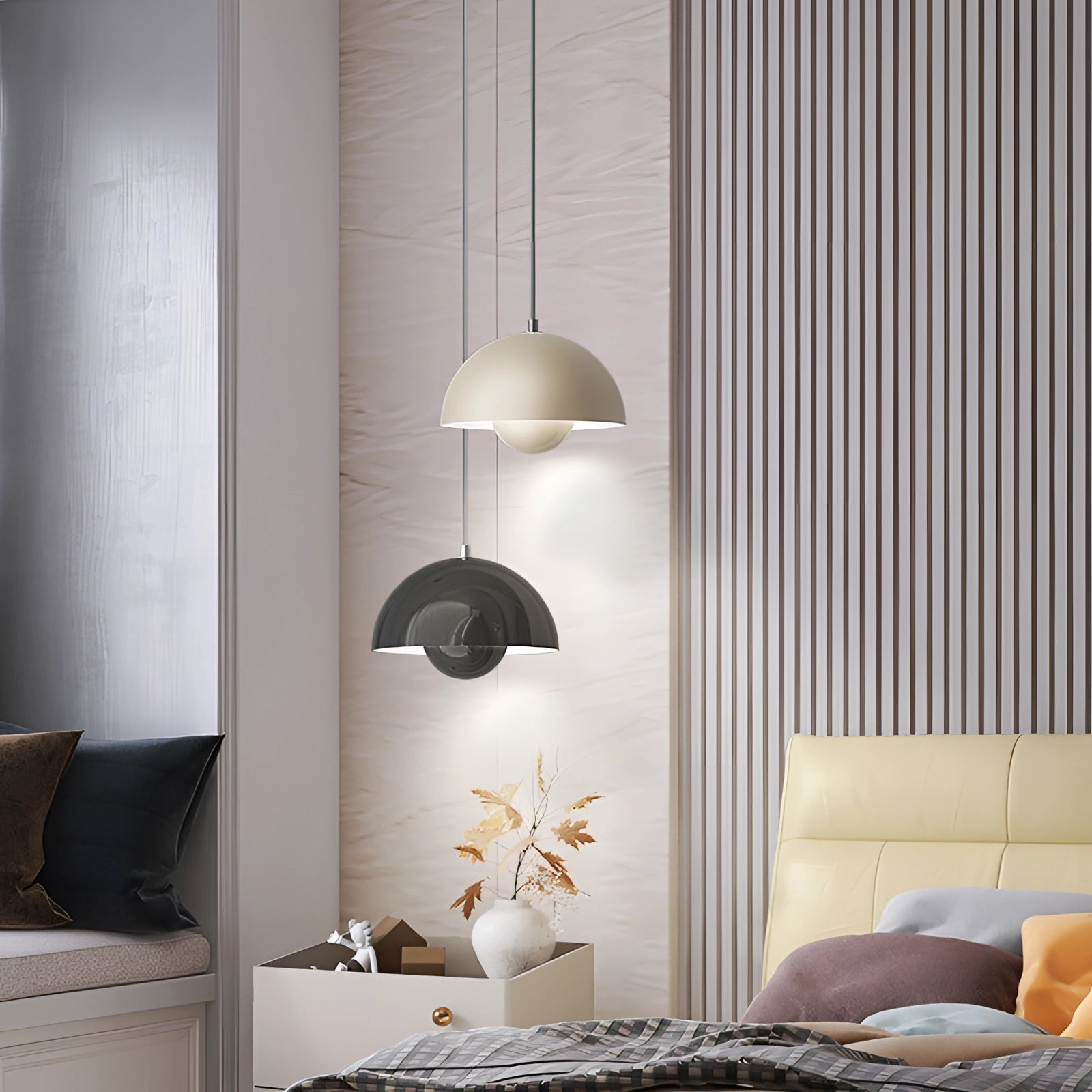 Auroraglo V2 Colorful Pendant Lights in Modern Retro Yellow, White, and Orange hanging in a stylish living room with wooden furniture and grey textiles.
